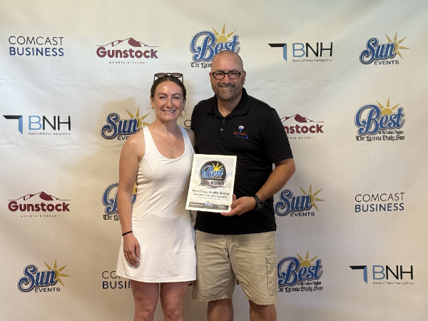 Bob and Emily receiving Silver Award